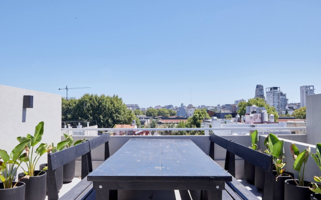 Unique triplex with rooftop private use