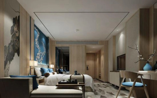 Xinzheng Xingangwanhua Hotel