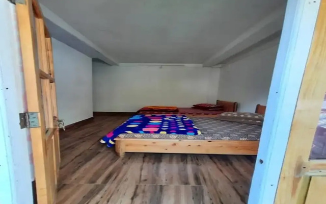 Goroomgo Lotus Born Homestay Darjeeling