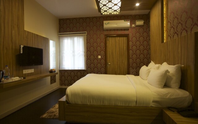 FabHotel Grand Savoury Suites