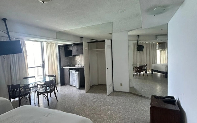 Suites Omega Torres Gemelas