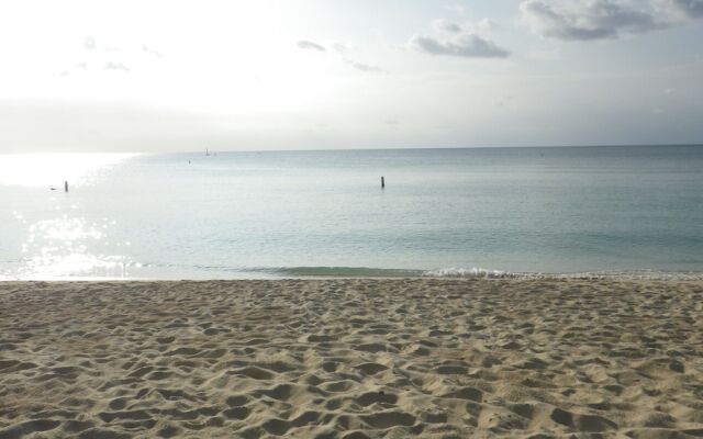 Sunrise Waterways by Cayman Vacation