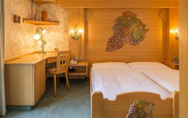 Hotel Olympia AG – Guest Rooms – Saas Almagell