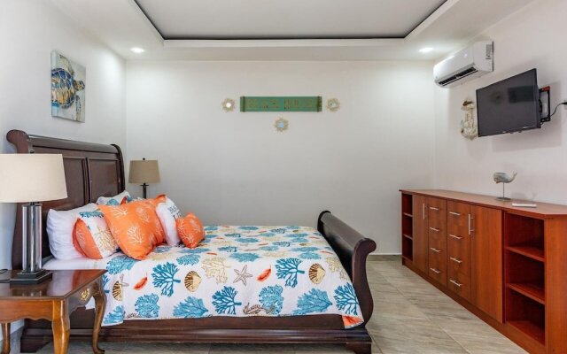 Ultramodern Townhome with an Inviting Coastal Design and Lush Outdoor Oasis with a Private Pool