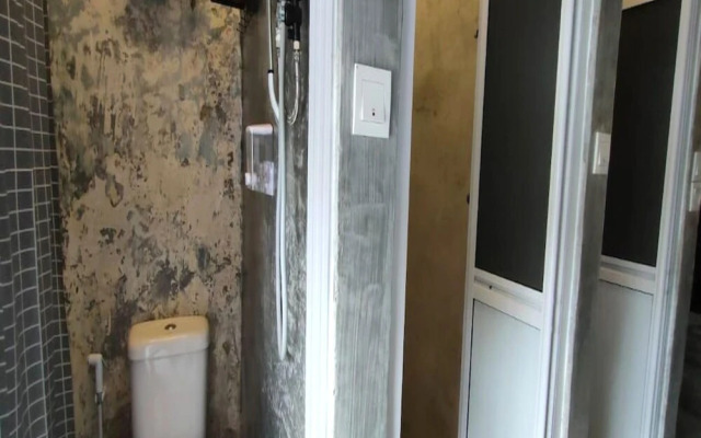 SPOT ON 90746 Vspace Guesthouse & Cafe