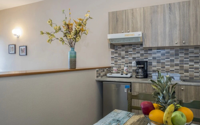 Theos village apartments
