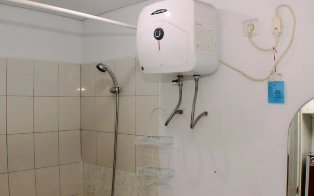 Warm And Simply Studio Room At Azalea Suites Apartment