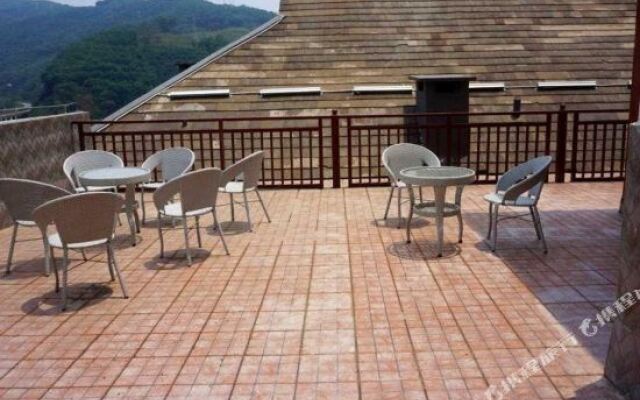 Xishuangbanna Shibao Business Hotel