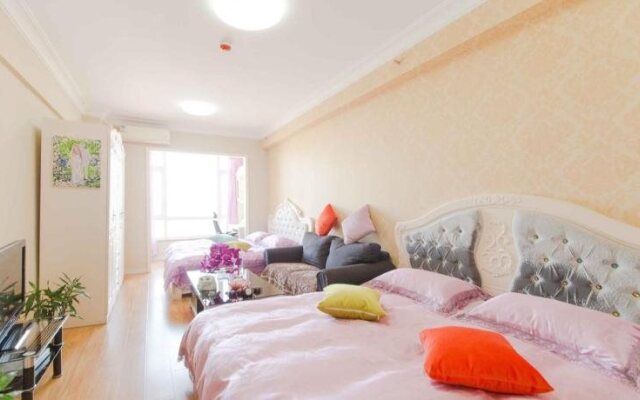 Aiqinhai ApartHotel
