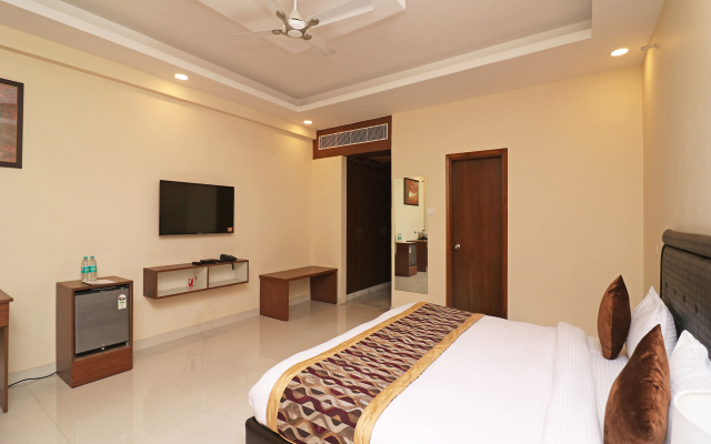 OYO 26911 Kcg Hotels