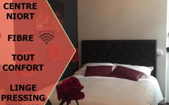 Le Romantic centre 400m gare wifi linge de pressing