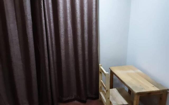 Mikocheni Studio APartment with a car