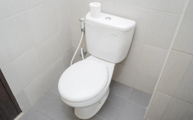 Compact and Monochrome Studio Room Bintaro Icon Apartment