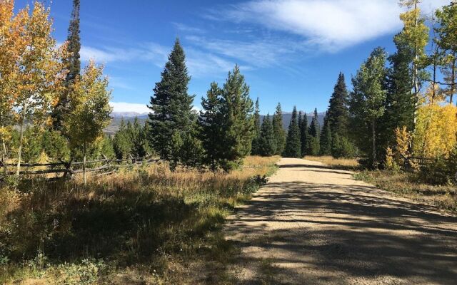 Miles Behind Log Cabin by Stay Winter Park