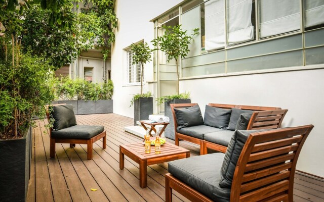 Serene Retreat with Lush Garden by Sea N Rent