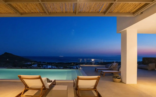 Monogram Travel Tinos