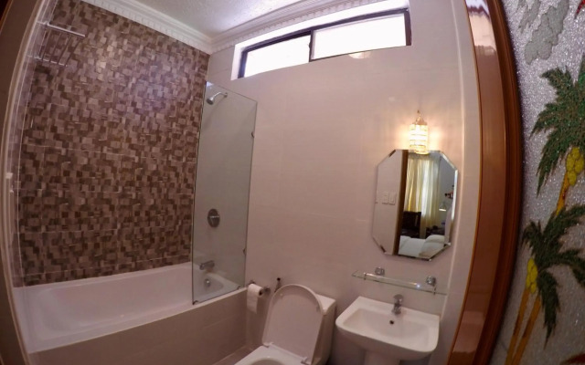 The Executive Villa Inn & Suites