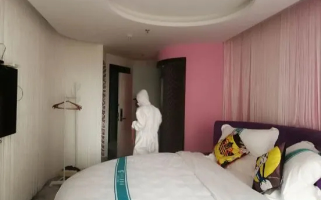 Haikou Green Orange Theme Hotel (Wuyue Plaza, East High-speed Railway Station) – Guest Rooms – Haikou