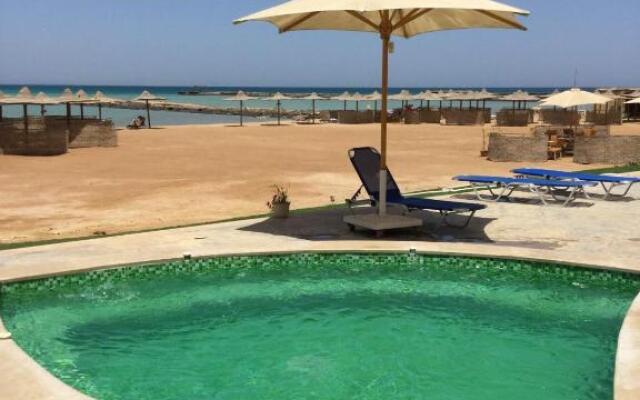 Apartment With Direct Access to Private Beach