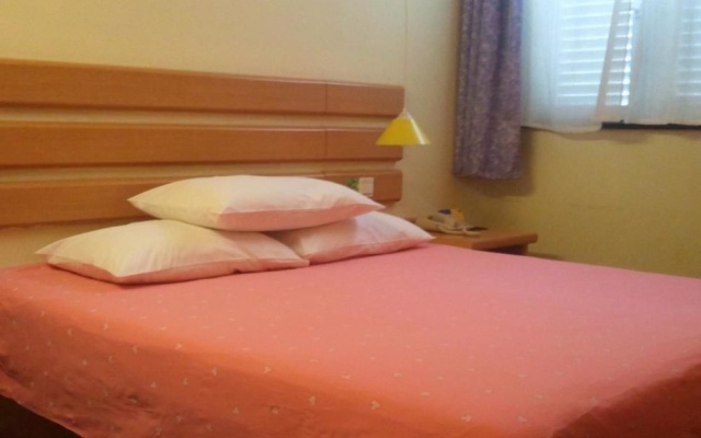 Home Inn Zhongshan University in Guangzhou Binjiang Road – Guest Rooms – Guangzhou
