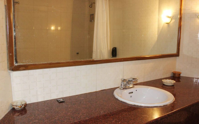 OYO Premium Sector 26 Madhya Marg