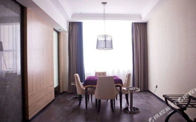 Shengjing Yijia Hotel (Xiangyang Railway Station People's Square Branch)