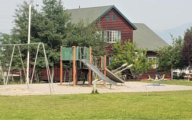 Wolf Den Log Cabin Motel and RV Park