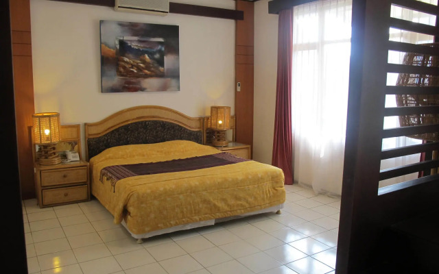 Puri Naga Beachfront Cottages