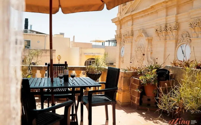 A Pretty Duplex Apartment in a Gozo Village Square