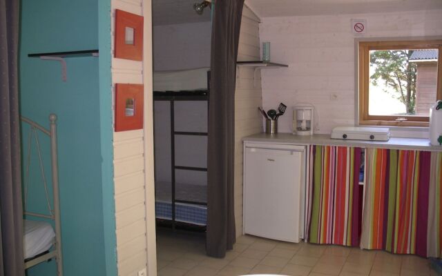 Camping Le Petit Lion - Lodges Bois