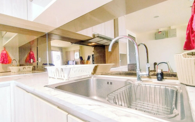 Homey Designed 2BR in City Center at Praxis Apartment