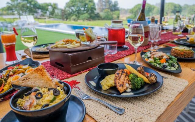 SaffronStays Onellaa, Nashik - infinity pool villa surrounded by a vineyard