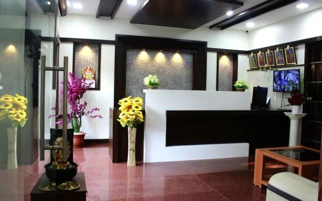 Rithikha Inn crest