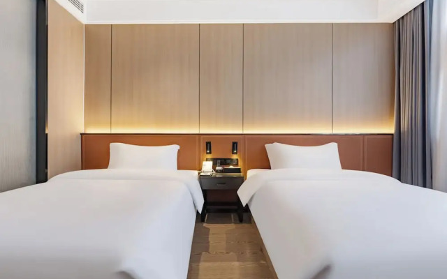 Wanzai Yijia La Maison Hotel