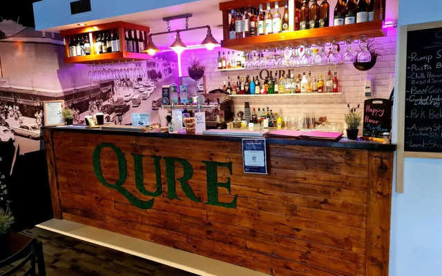 Qure Restaurant & Apartments