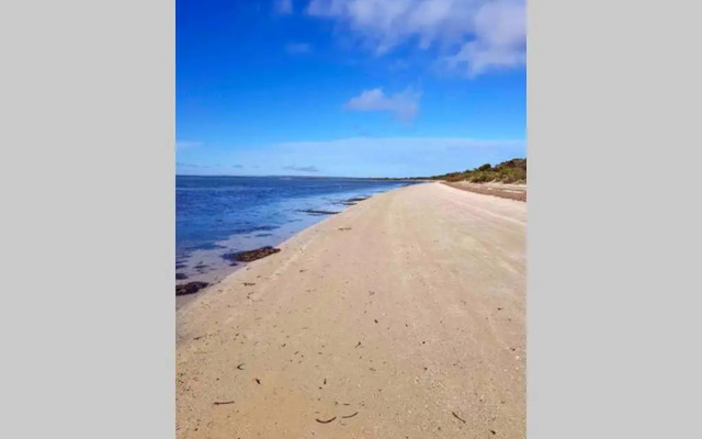 Leeward 'tranquil beachfront'