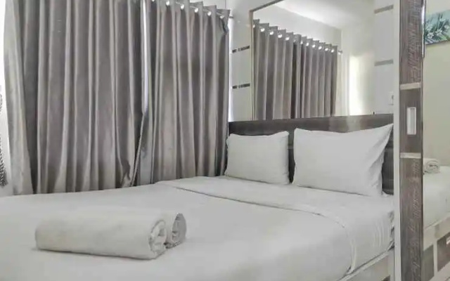 Cozy and Best Deal 2BR Vida View Apartment By Travelio