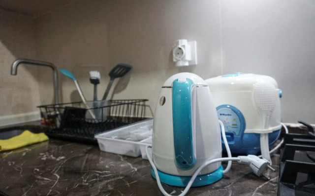 Chic and Cozy Studio Apartment at Puri Mansion