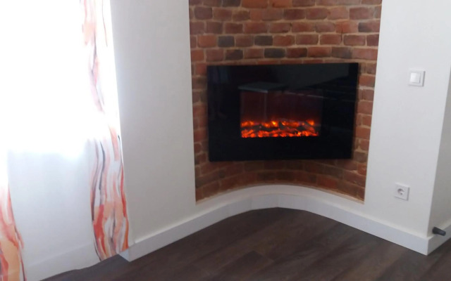 Apartment with fireplace