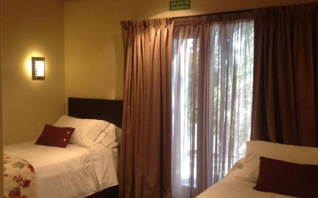 Maria del Bosque Apart Hotel / Cabañas