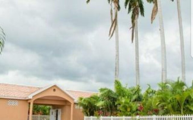 Caymanas Estate Neighbor