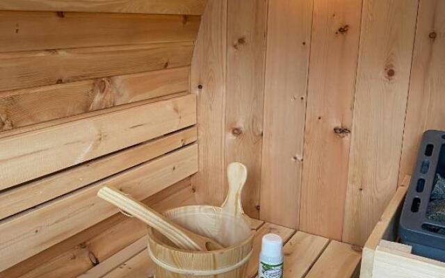 Ferienhaus "Ruhepol" im Ferienpark Extertal - Kamin, Fass-Sauna, Massagesessel