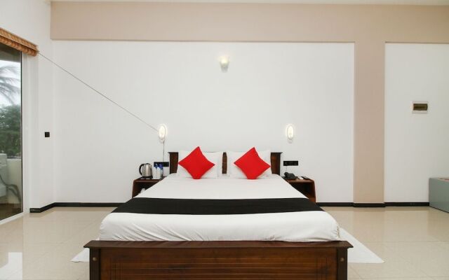 Capital O 311 Grace Beach Resort