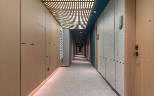 Ginza Jiayue Select Hotel (Qihe Wanda Plaza Spring City Oulebao)