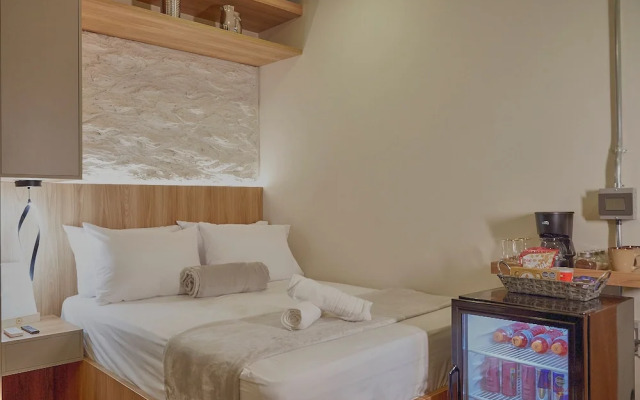 One Apartments Lleras