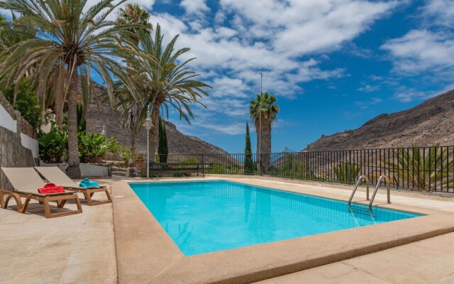 Casa de vacaciones con piscina compartida en Mogán II