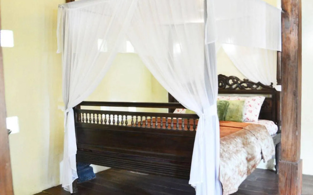 The Riverside Javanese Cottages