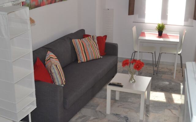 Reservaloen Puerta del Arenal / Topibe SL