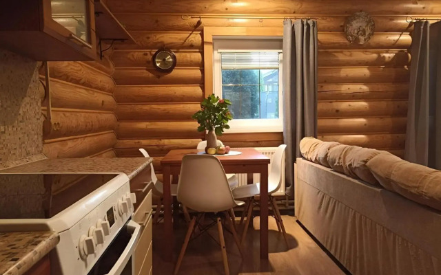Log house with a Russian wood-burning sauna