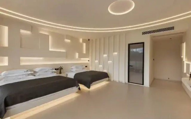 Dali Mubo Holiday Sea View Hotel (Ideal Village Branch)